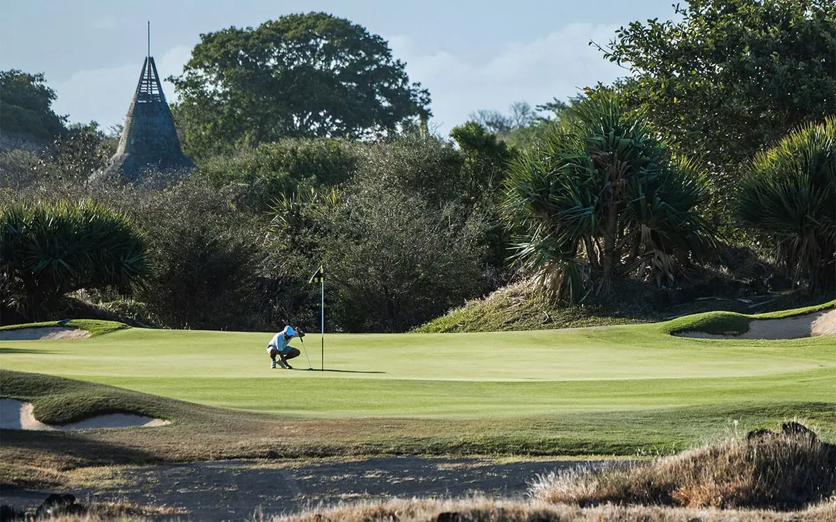 Golfer on the green at Mont Choisy Le Golf